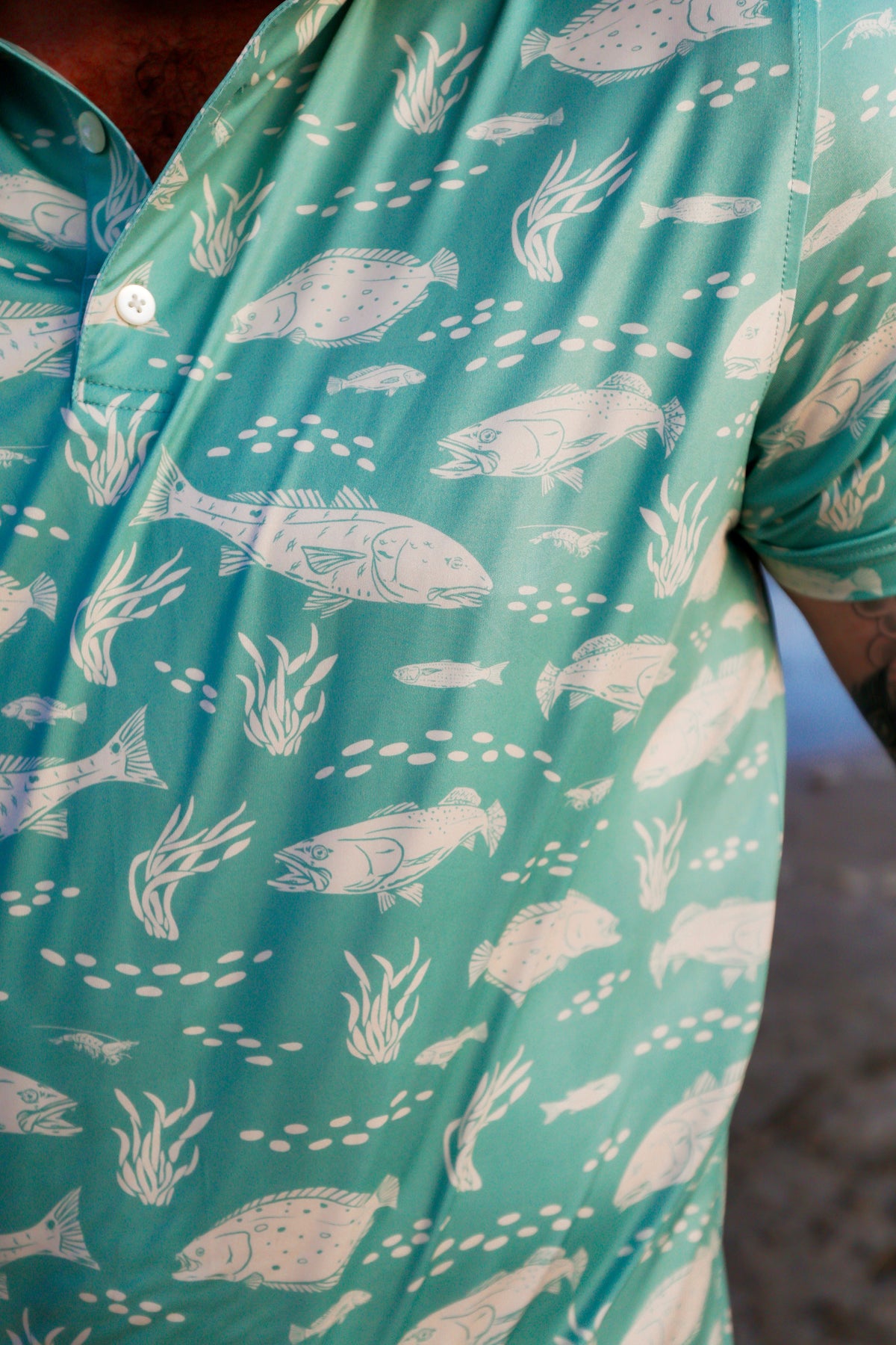 Close-up detail of light blue and green Texas Slam pattern performance fabric.