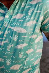 Close-up detail of light blue and green Texas Slam pattern performance fabric.