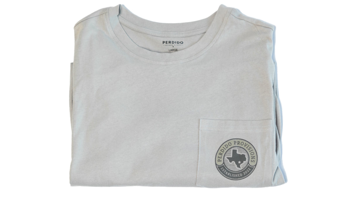 Folded gray t-shirt with a front pocket and speckled trout illustration.