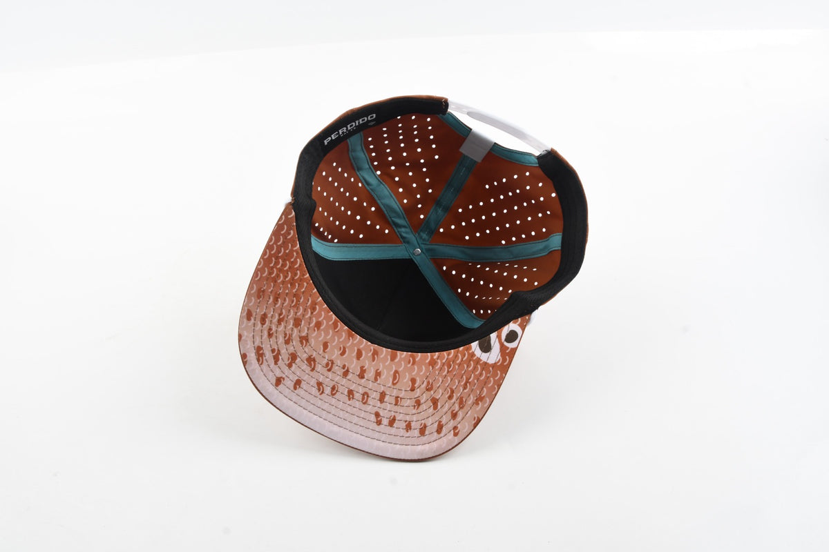 Underside view of The Rojo hat showing patterned underbrim and interior sweatband.