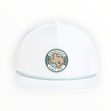 white mesh cap with rubber patch on white background