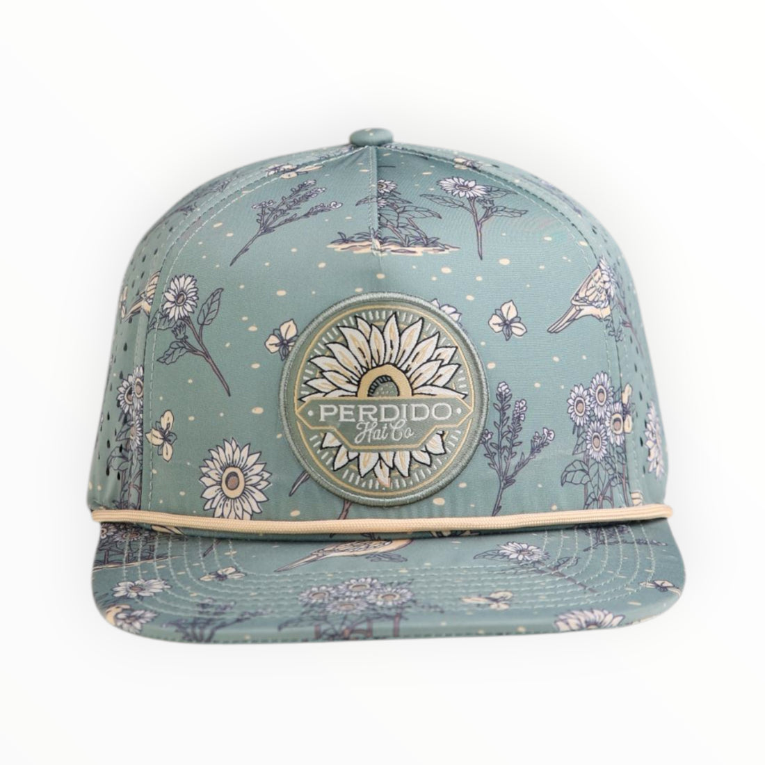Cap with floral pattern and 'Perdido' logo on a white background