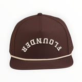 Brown cap with 'Flounder' embroidered on a white background