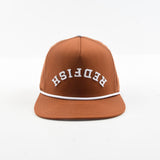 Front view of The Rojo rust brown snapback hat with white rope and arched Redfish lettering.